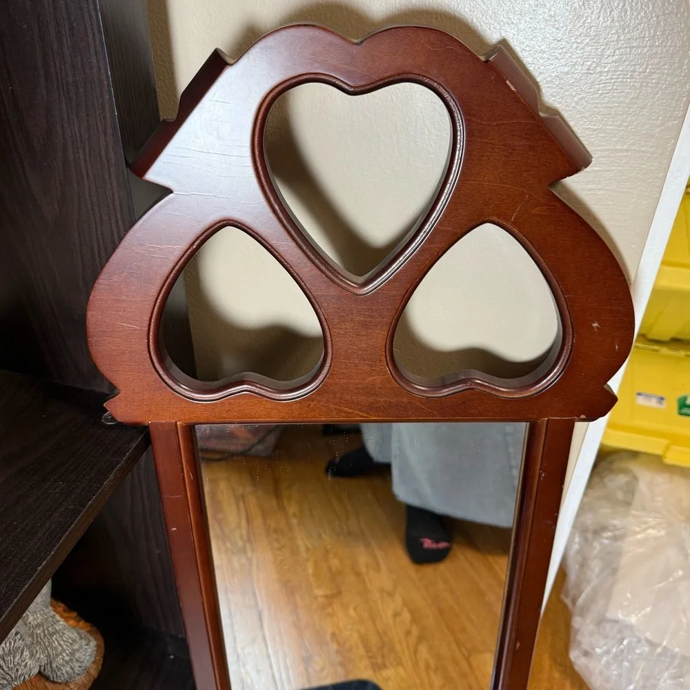 Vintage Dark Finish Wood Frame Mirror with Cut-Out Hearts on Top made by SEI.